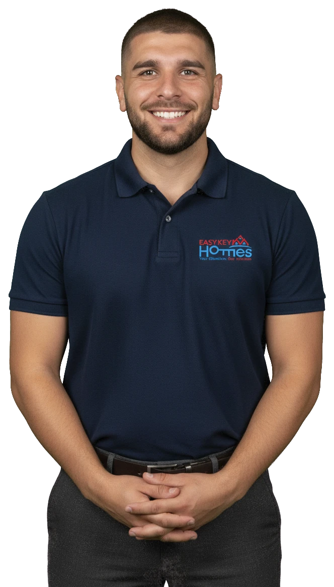 Smiling local home buyer in a navy cap and polo shirt